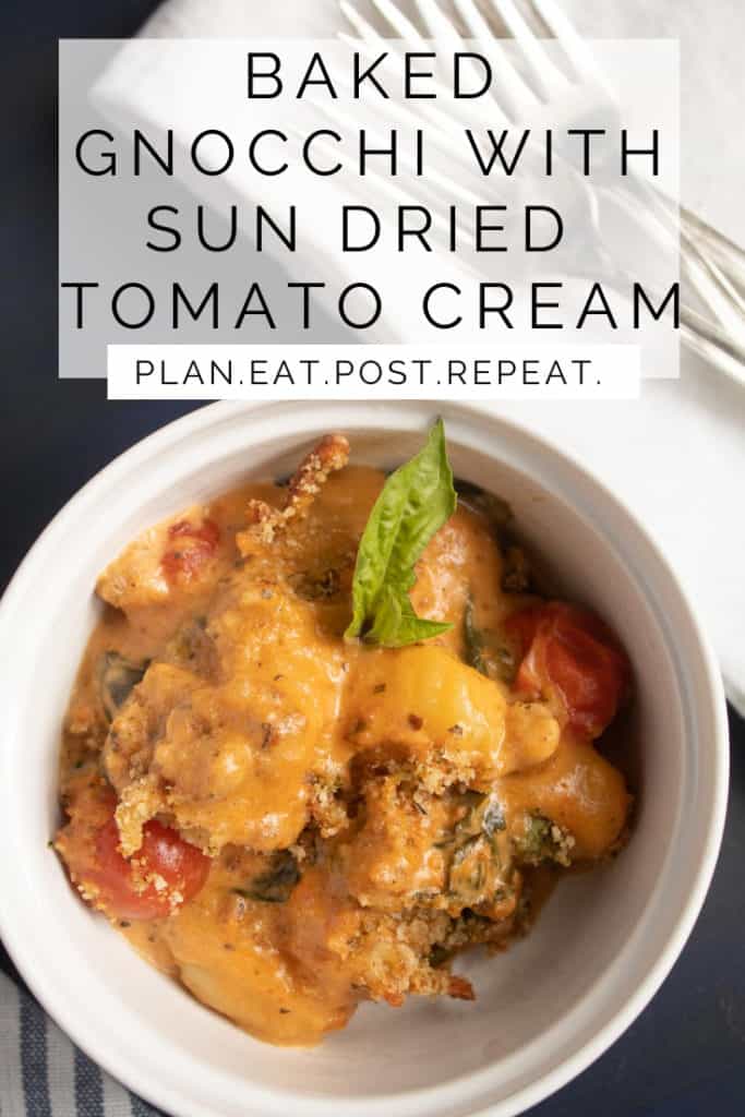 A bowl of of sauced gnocchi is in the bottom of the image. A white box with the words, "Baked Gnocchi with Sun Dried Tomato Cream" is above and "Plan. Eat. Post. Repeat." is in a white rectangle in the middle.