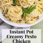 The spaghetti twirled into piles on a white platter and garnished with basil leaves. The words, "Instant Pot Creamy Pesto Chicken Spaghetti" and "Plan. Eat. Post. Repeat" are in a white box at the bottom of the image.