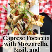 Slices of the focaccia are stacked on a white tray and drizzled with balsamic glaze and shredded basil. A white box at the bottom of the image contains the words, "caprese focaccia with mozzarella, basil, and tomatoes" and "Plan. Eat. Post. Repeat."