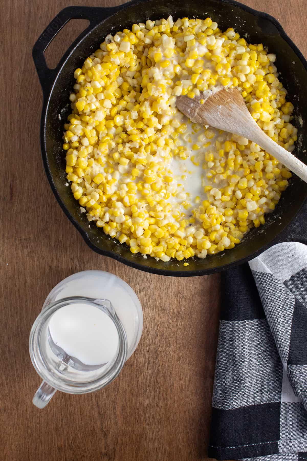 Milk is slowly added to the corn and flour mixture.