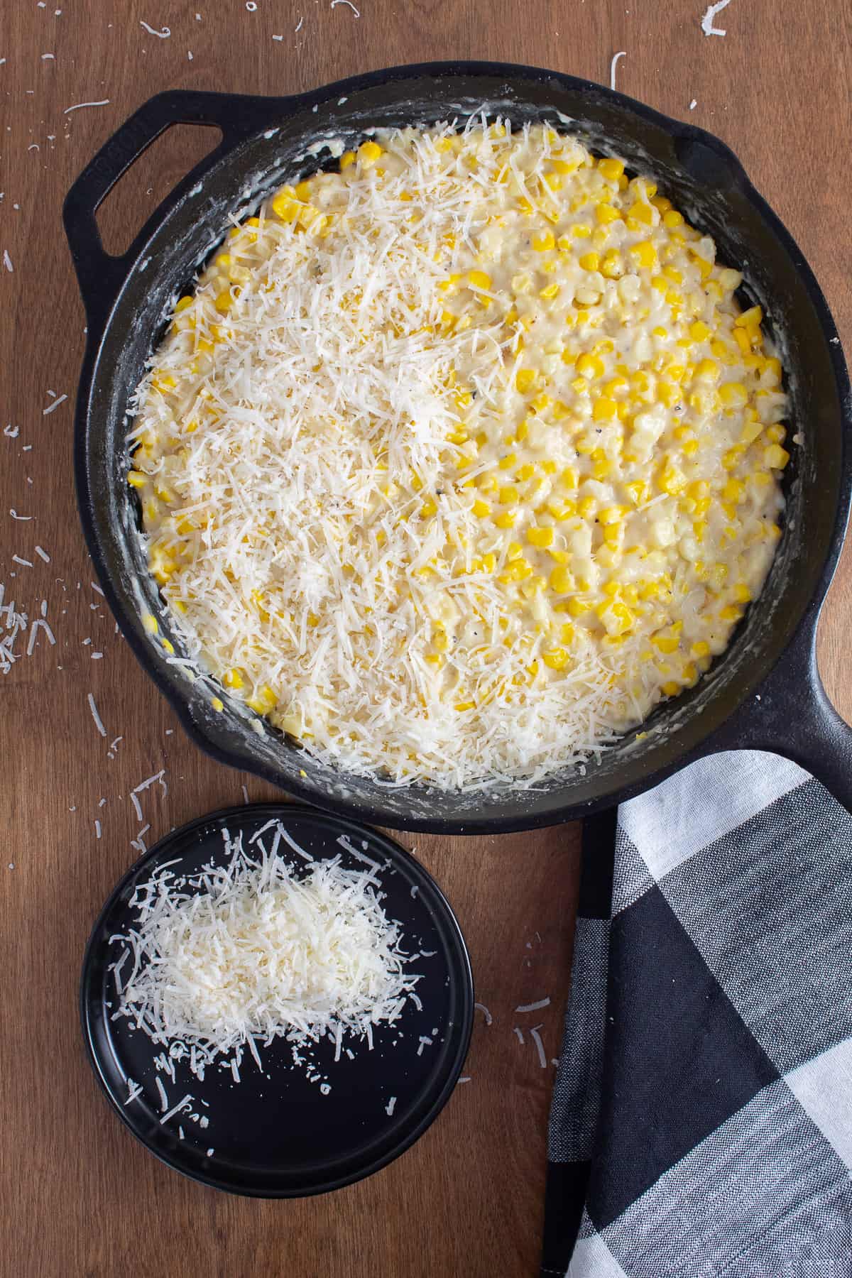 Shredded Parmesan cheese is sprinkled over the gratin.