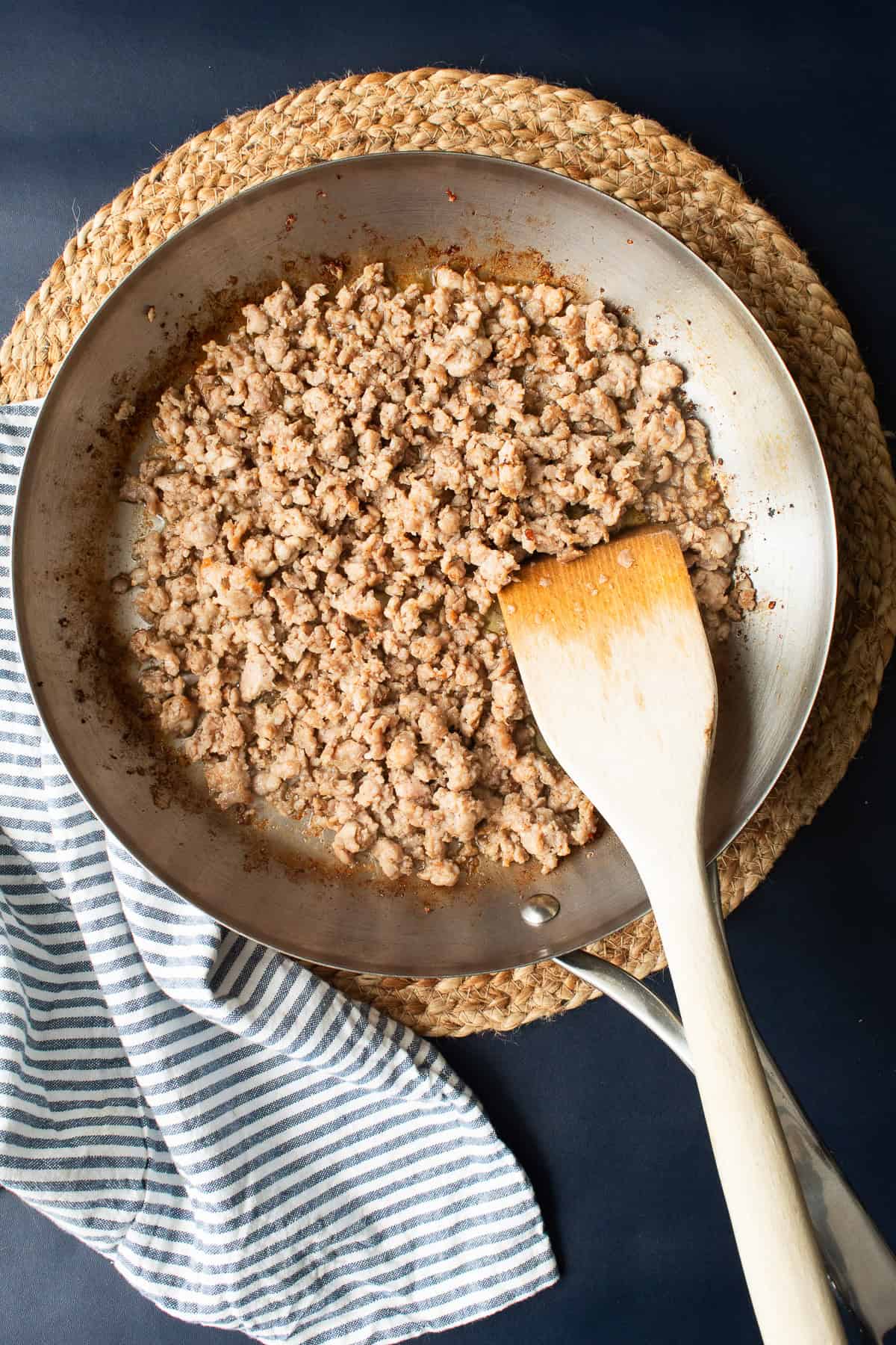 Breakfast sausage is browned in a large skillet.