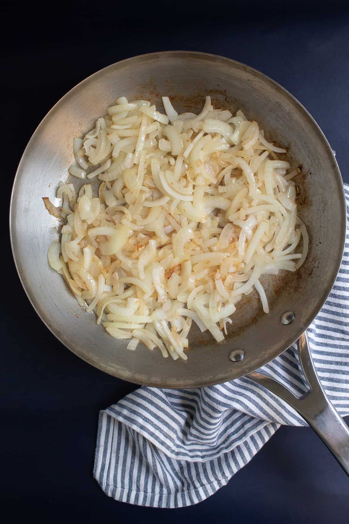 After 10 minutes of cooking, the onions begin to get some color and are softening.