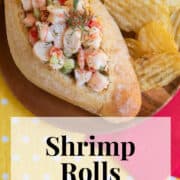 A shrimp roll garnished with dill sits on a wooden plate. A white text box at the bottom of the image contains the words, "shrimp rolls" and "plan. eat. post. repeat."