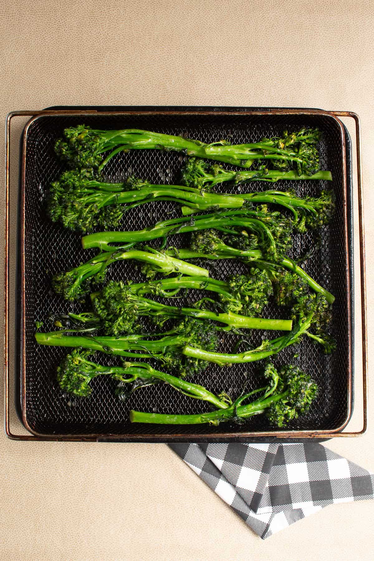 After 7 minutes of sir frying, the broccolini is ready to flip.