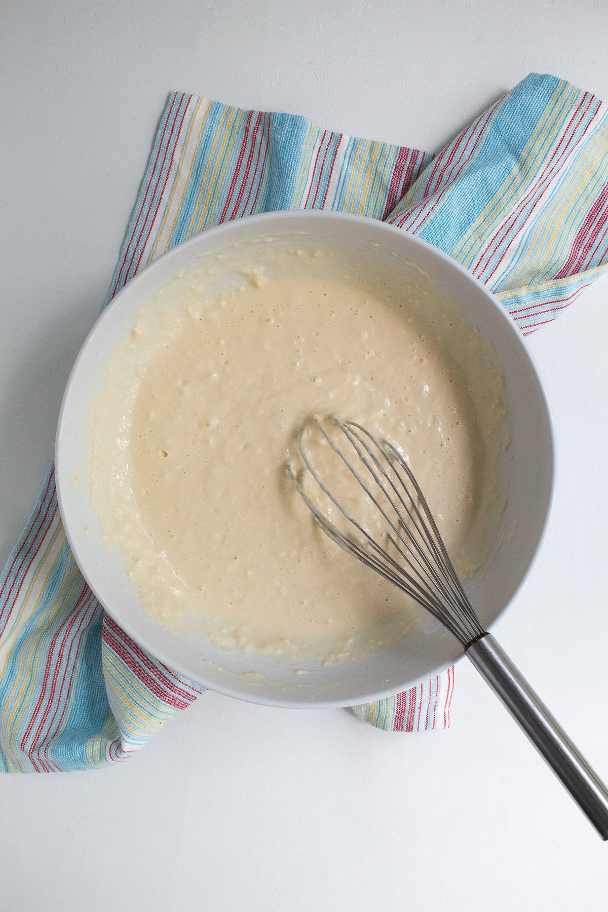 A thick batter is whisked together.