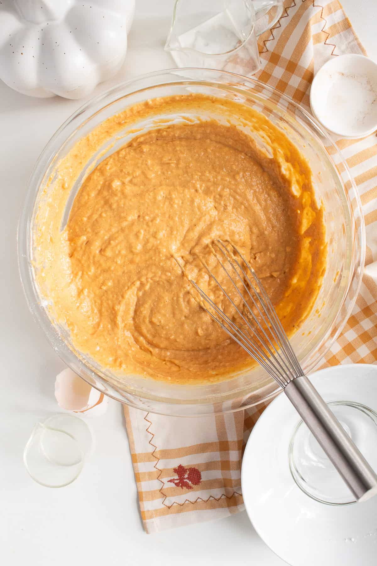 The prepared batter is whisked until smooth.