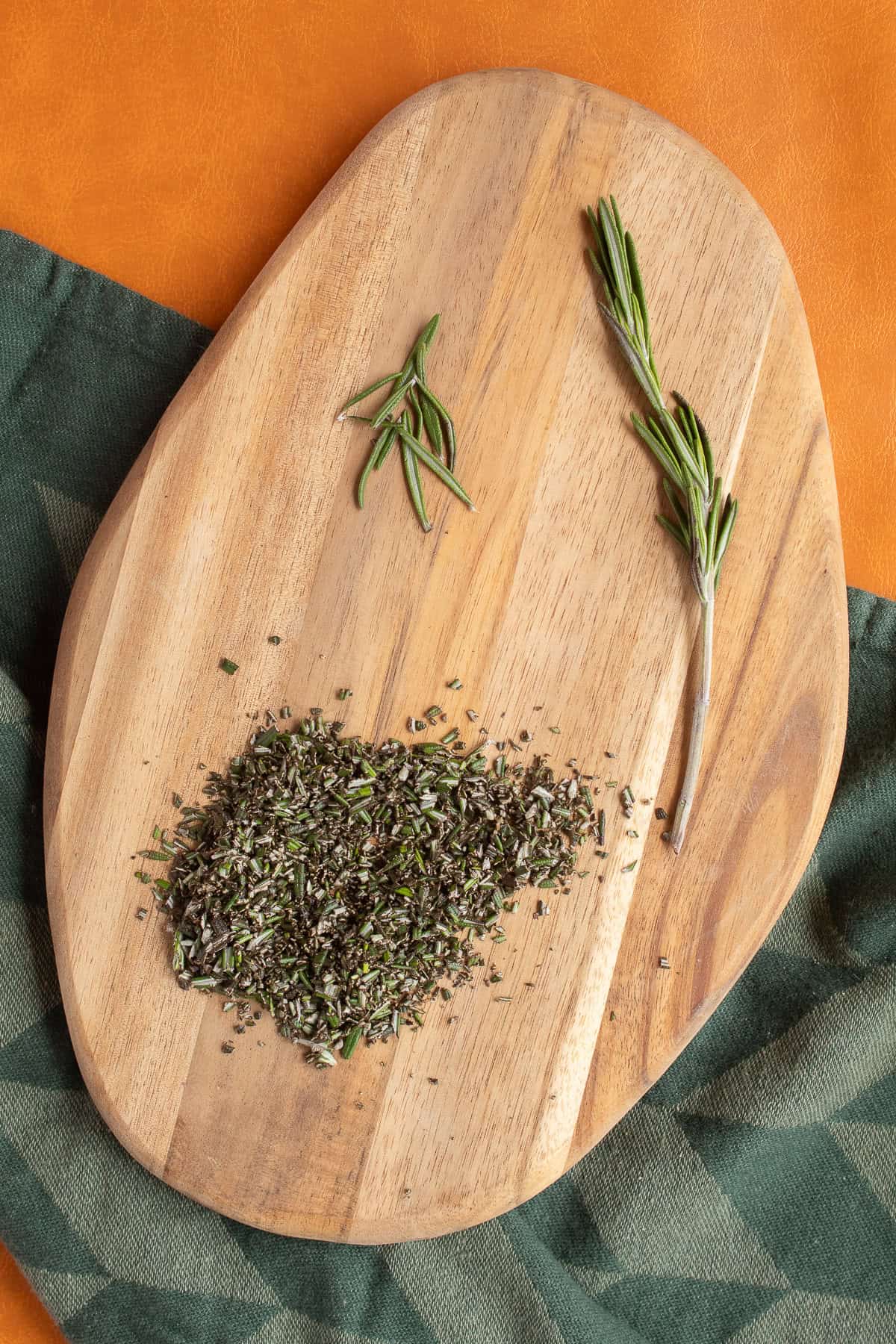 Rosemary is stripped from the stem and finely chopped.