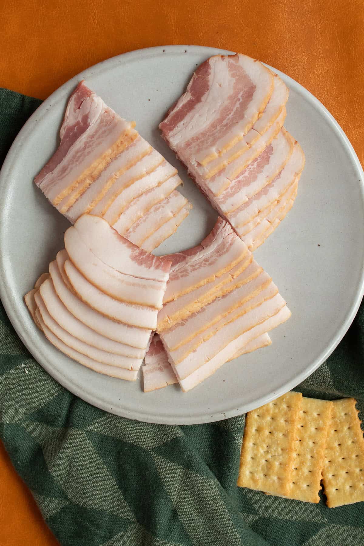 Each slice of bacon is cut into 4 pieces.