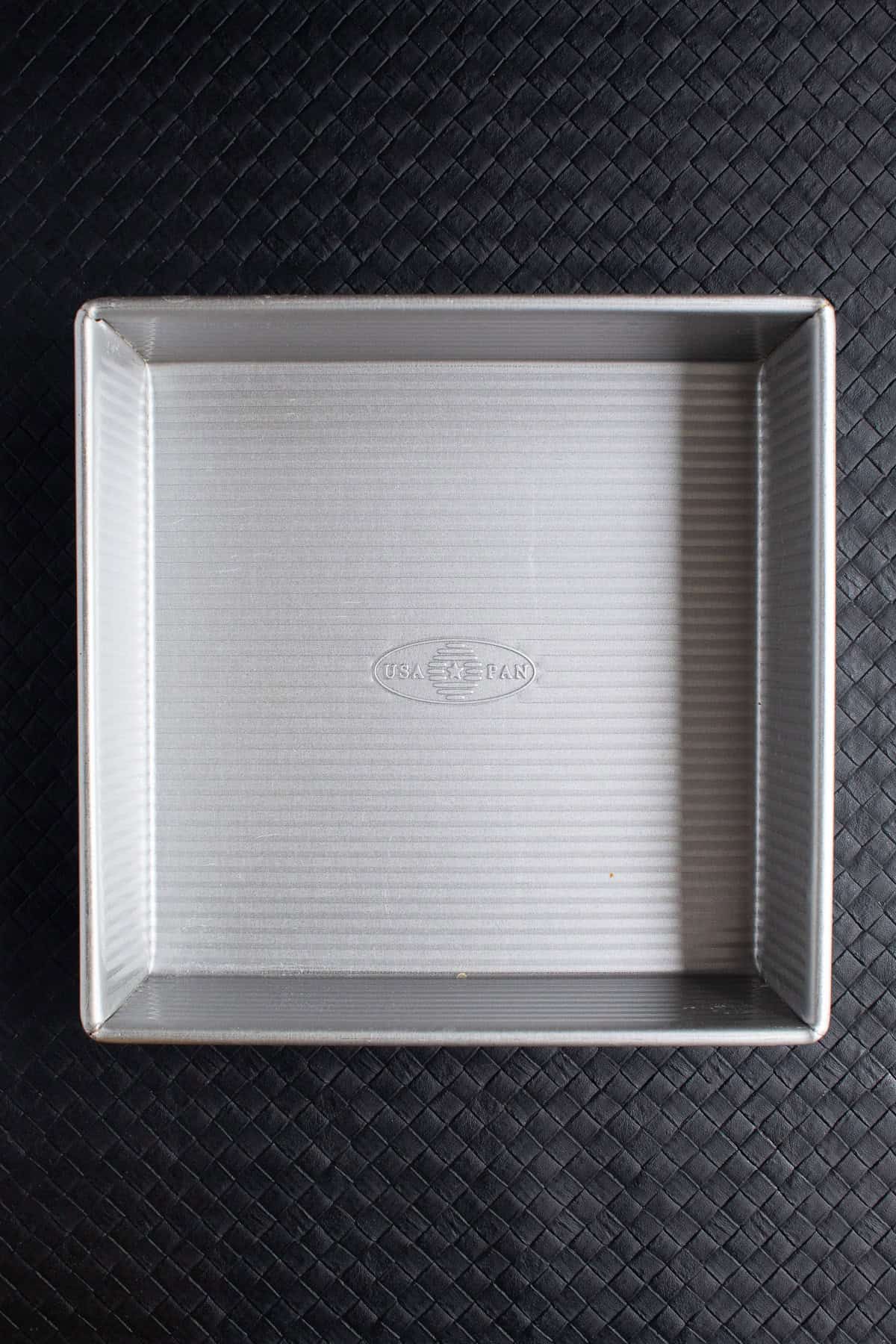 A nine inch square baking pan is used for the baked rice.