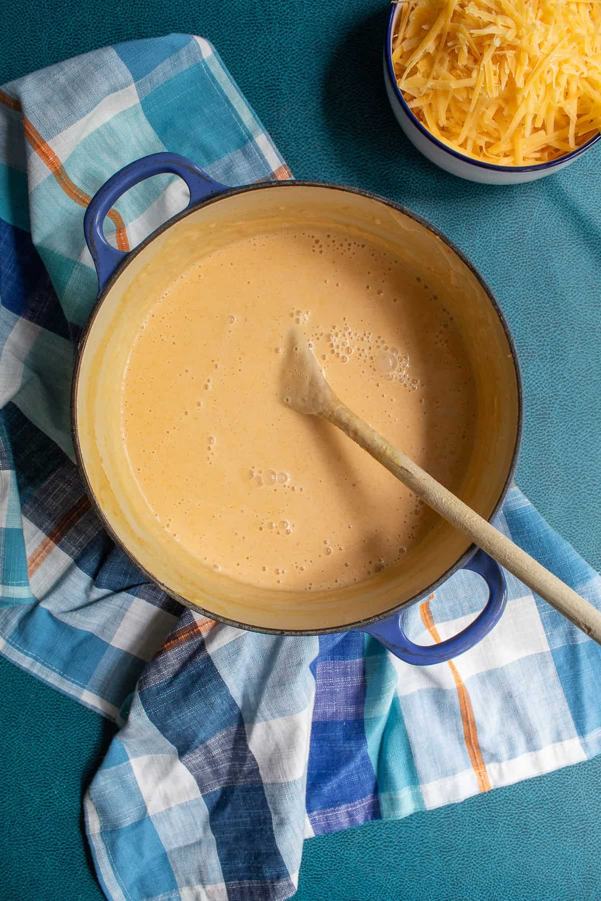 The blended soup base has a golden yellow color after the vegetable are thoroughly blended in.
