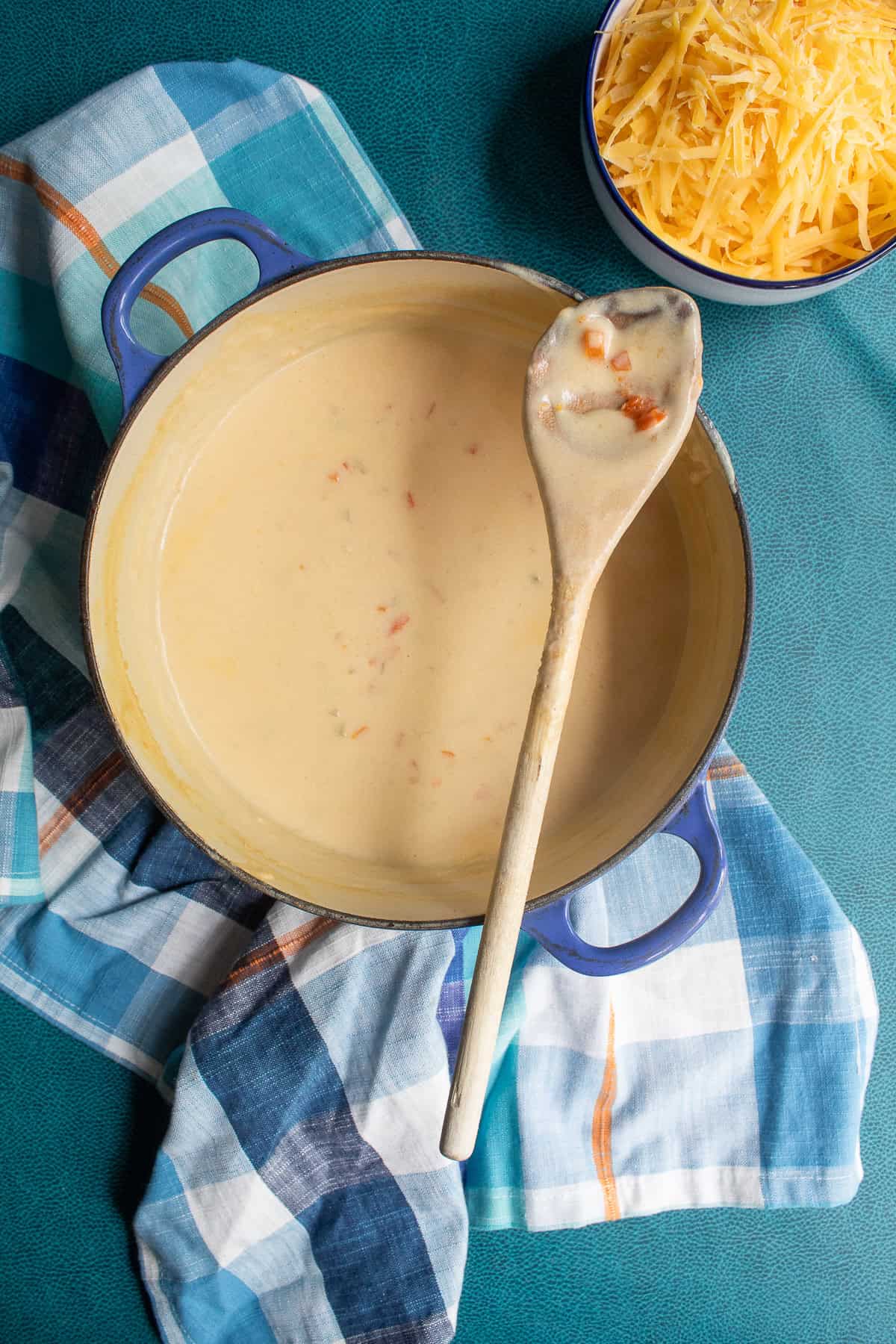 The soup has simmered long enough to allow the vegetables to soften.