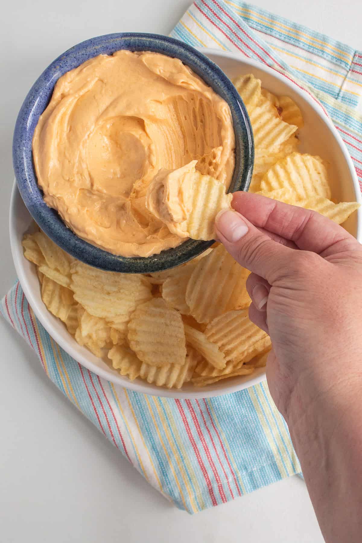Right from the processor, the cheese spread is whipped and soft enough for dipping potato chips.