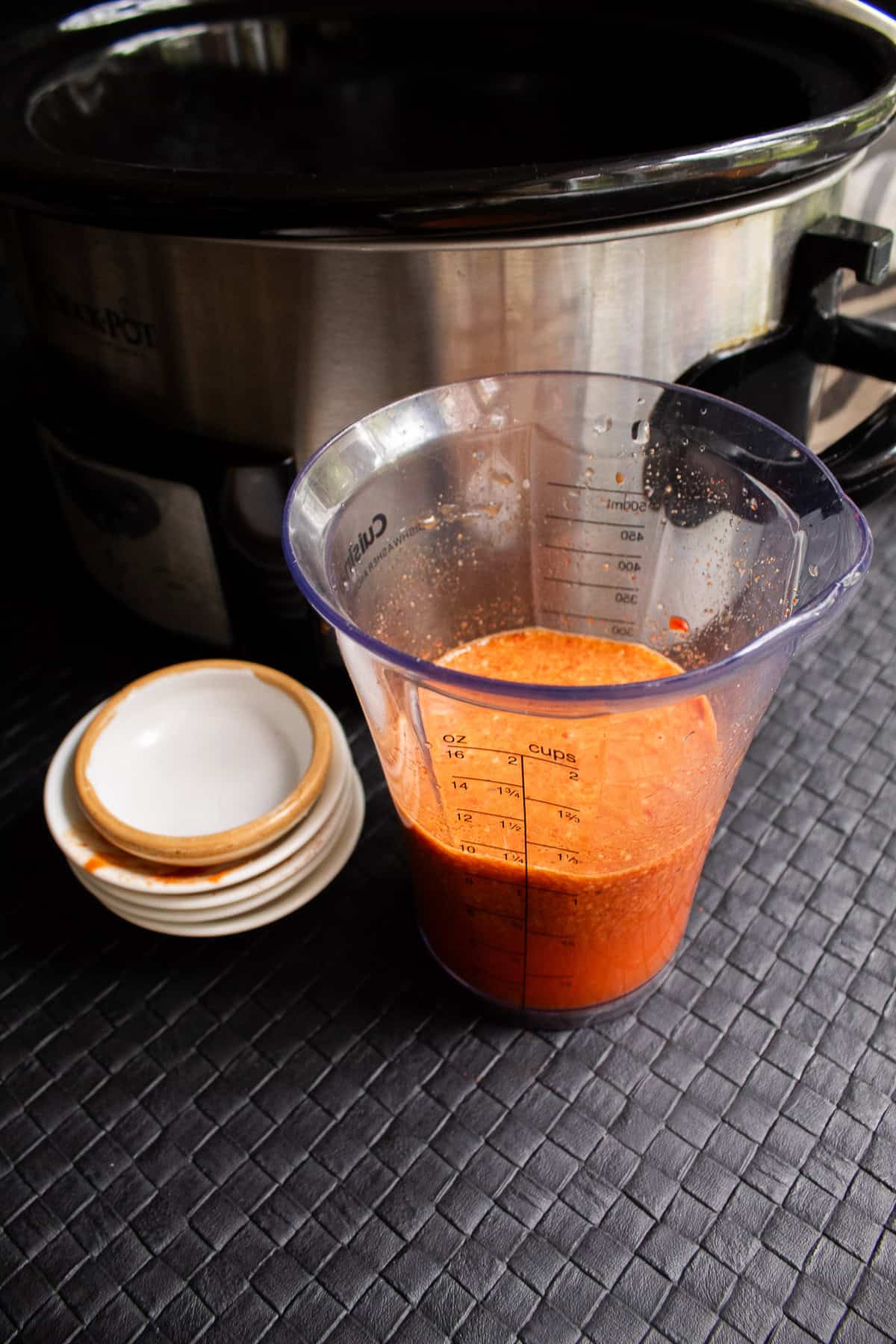 The blended seasoning liquid is bright orange.