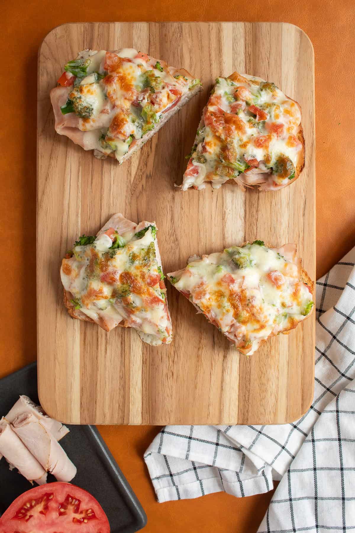 Each sandwich is cut in half for serving.