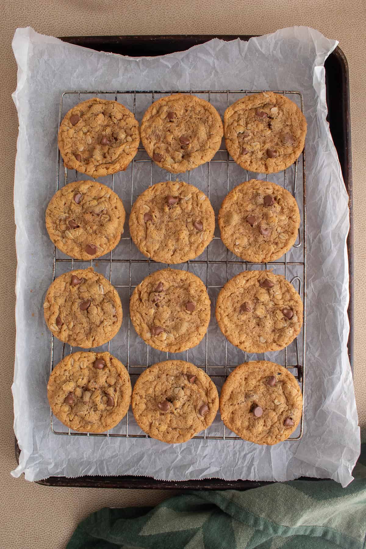 The cookies finish cooling on a wire rack.