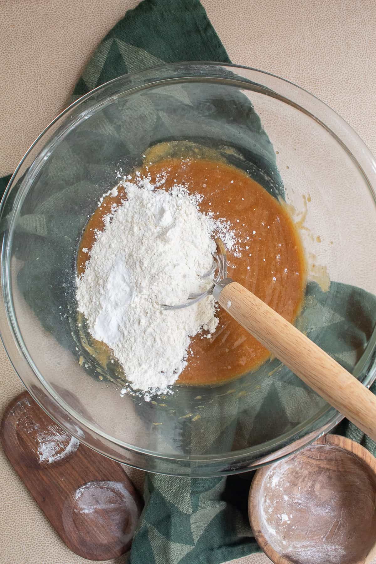 The dry ingredients are sprinkled over the wet ingredients.