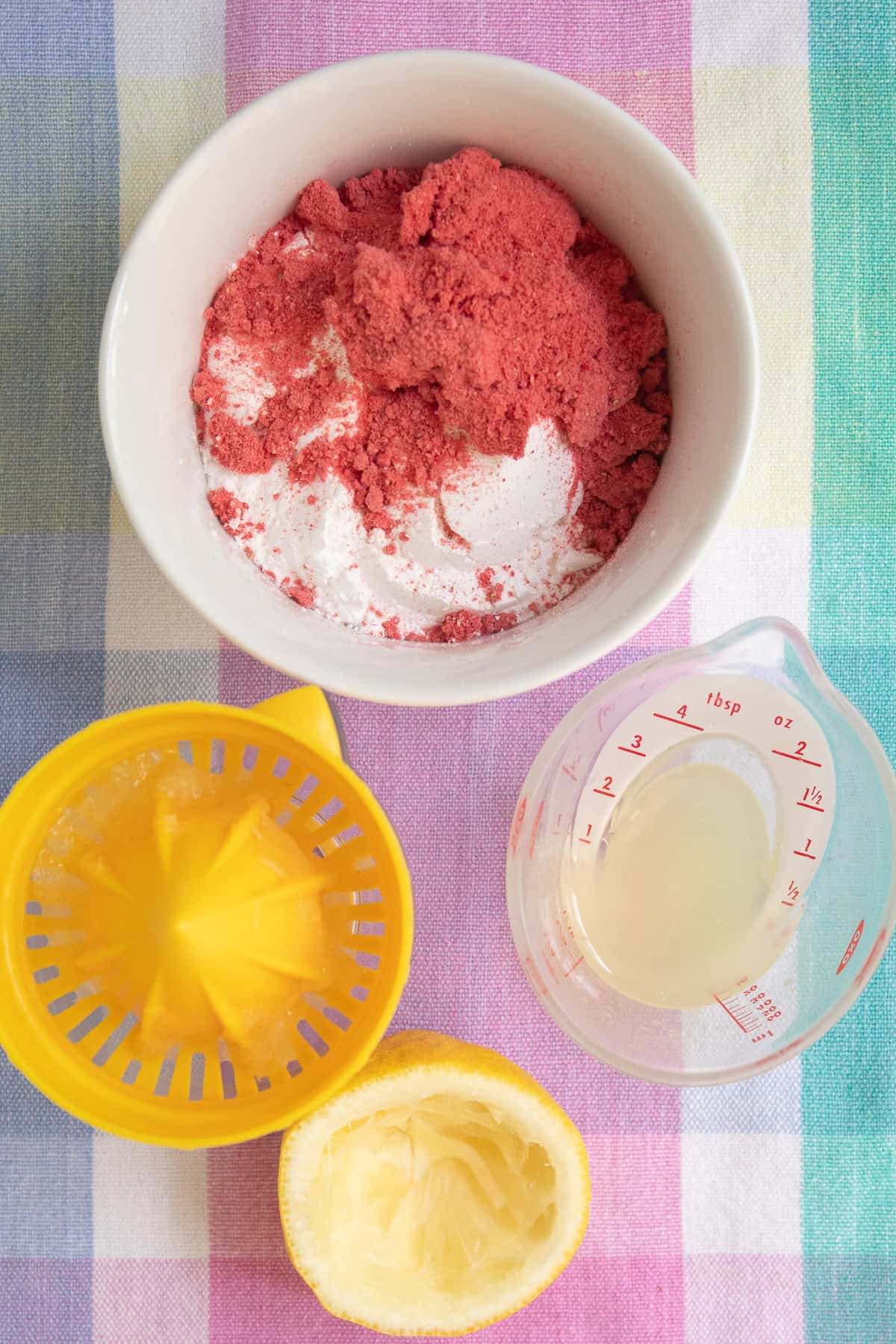 Freeze-dried strawberry powder is added to powdered sugar and lemon juice to form a strawberry glaze.