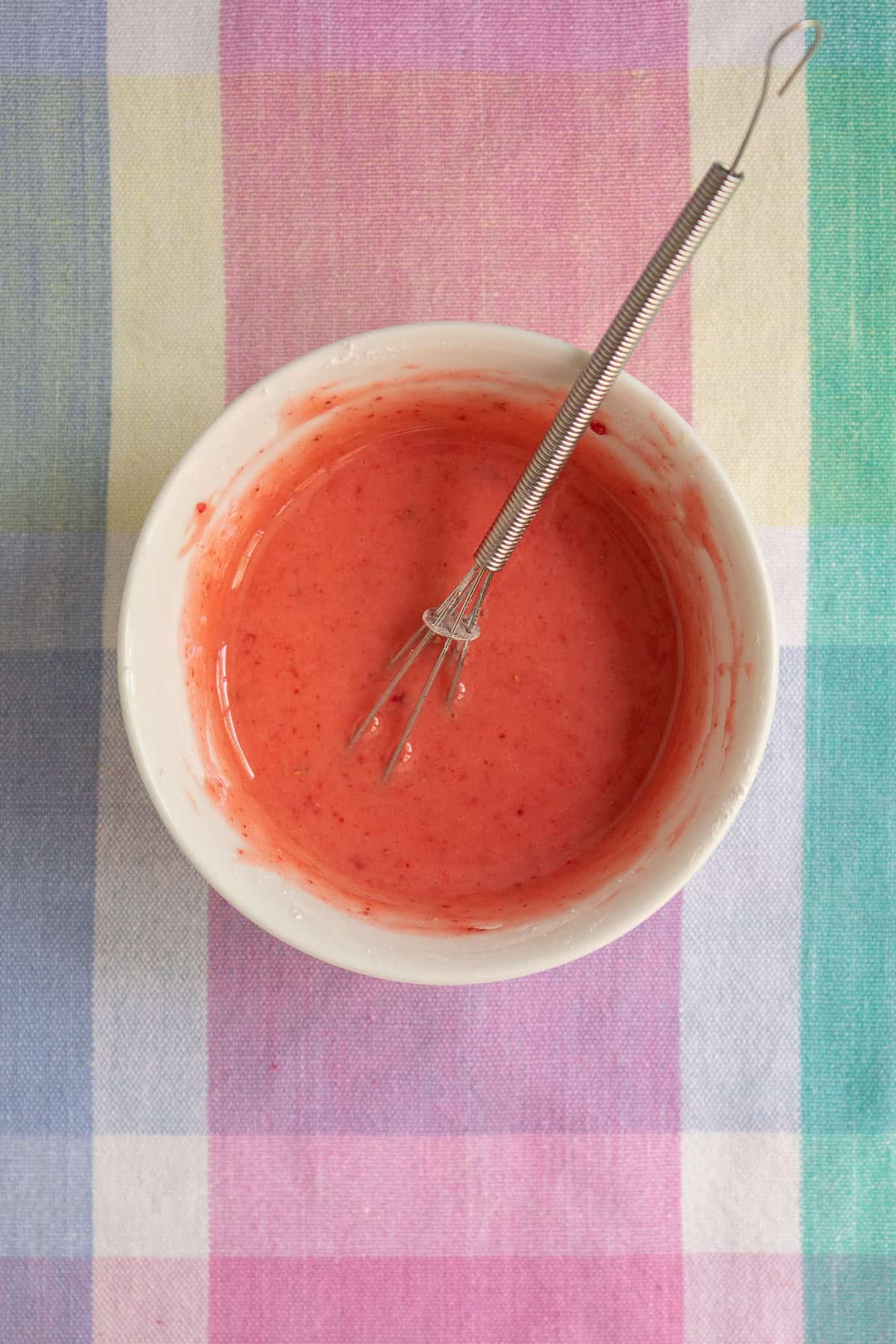 The strawberry glaze is bright pink in color.