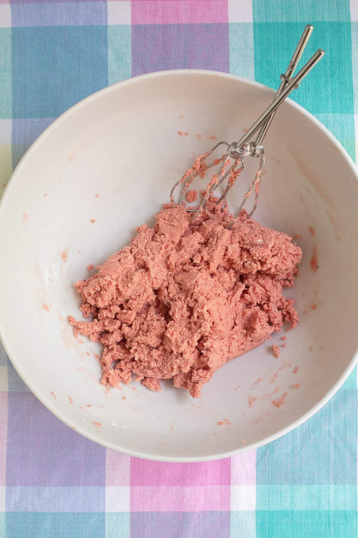The dough will come together into a soft, smooth ball.