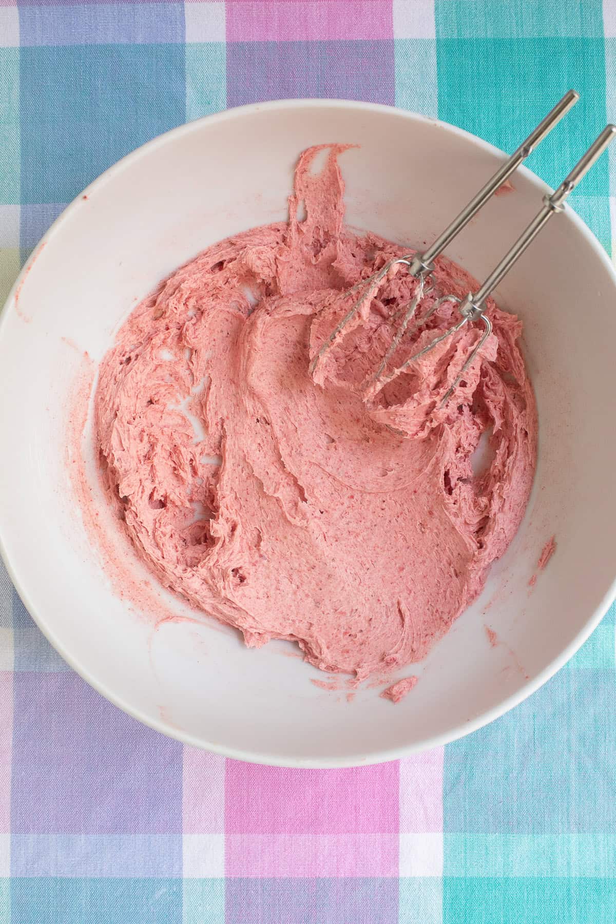 The strawberries and sugar are well blended with the butter.
