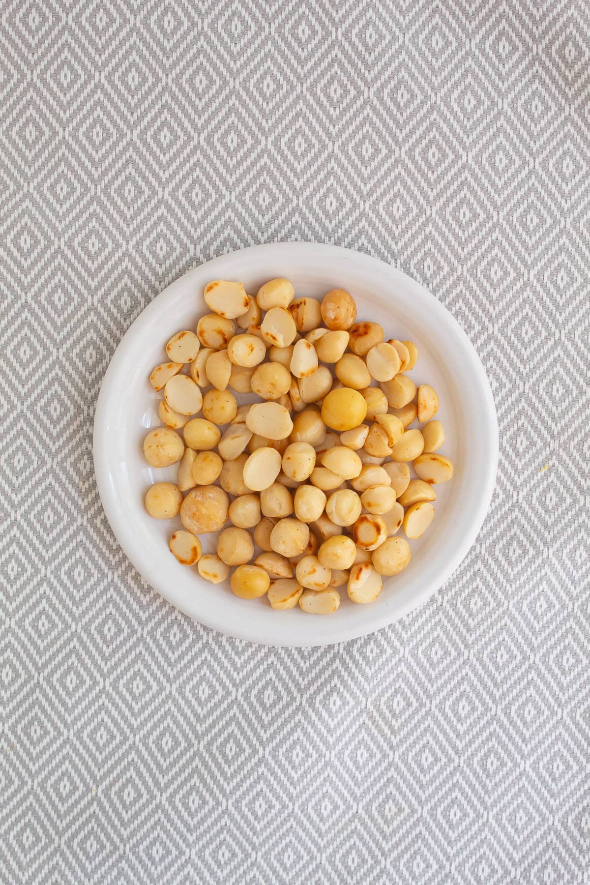 The macadamia nuts take on a bit of golden color after toasting.
