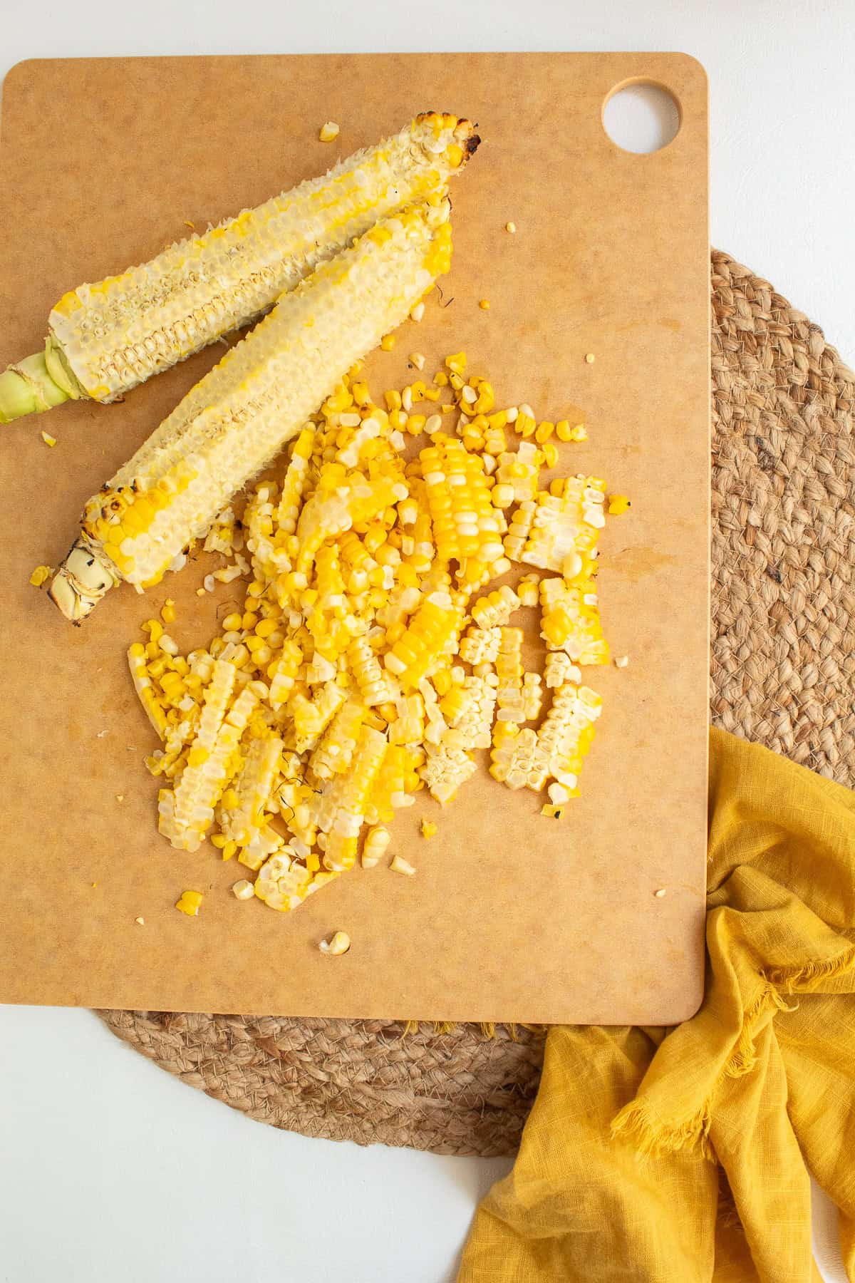 The grilled corn is cut from the cobs.