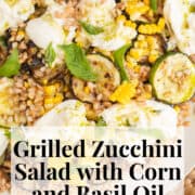 The salad, with visible grains of farro, kernels of corn, grilled zucchini slices, torn basil, burrata, and green vinaigrette, is piled on a wide platter. A white text box at the bottom of the image contains the words, "grilled zucchini salad with corn and basil oil" and "plan. eat. post. repeat."