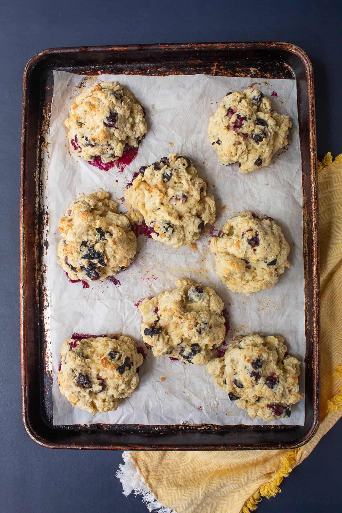 The baked biscuits are fluffy and golden brown.