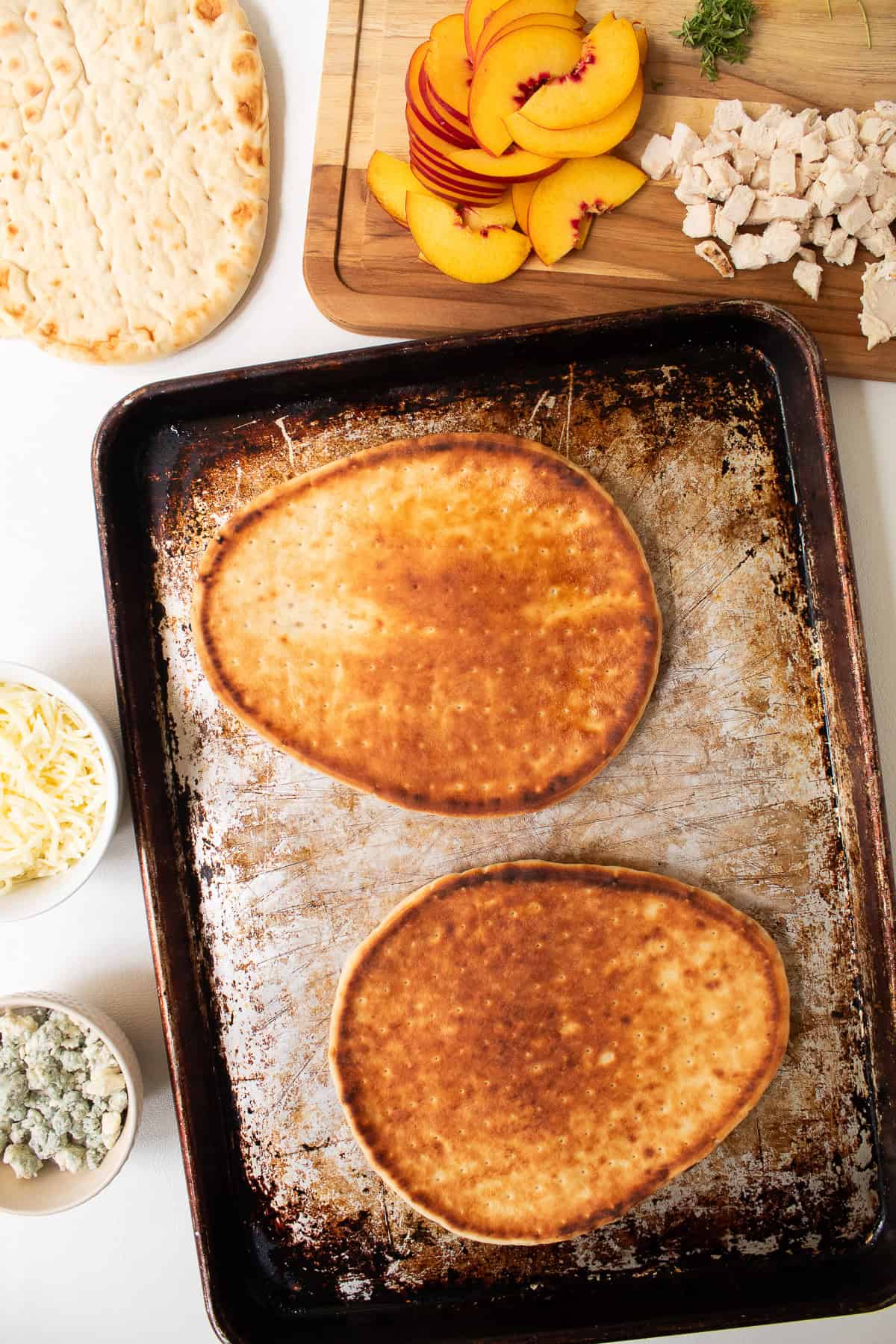 The undersides of the flatbread have been toasted to a golden brown.