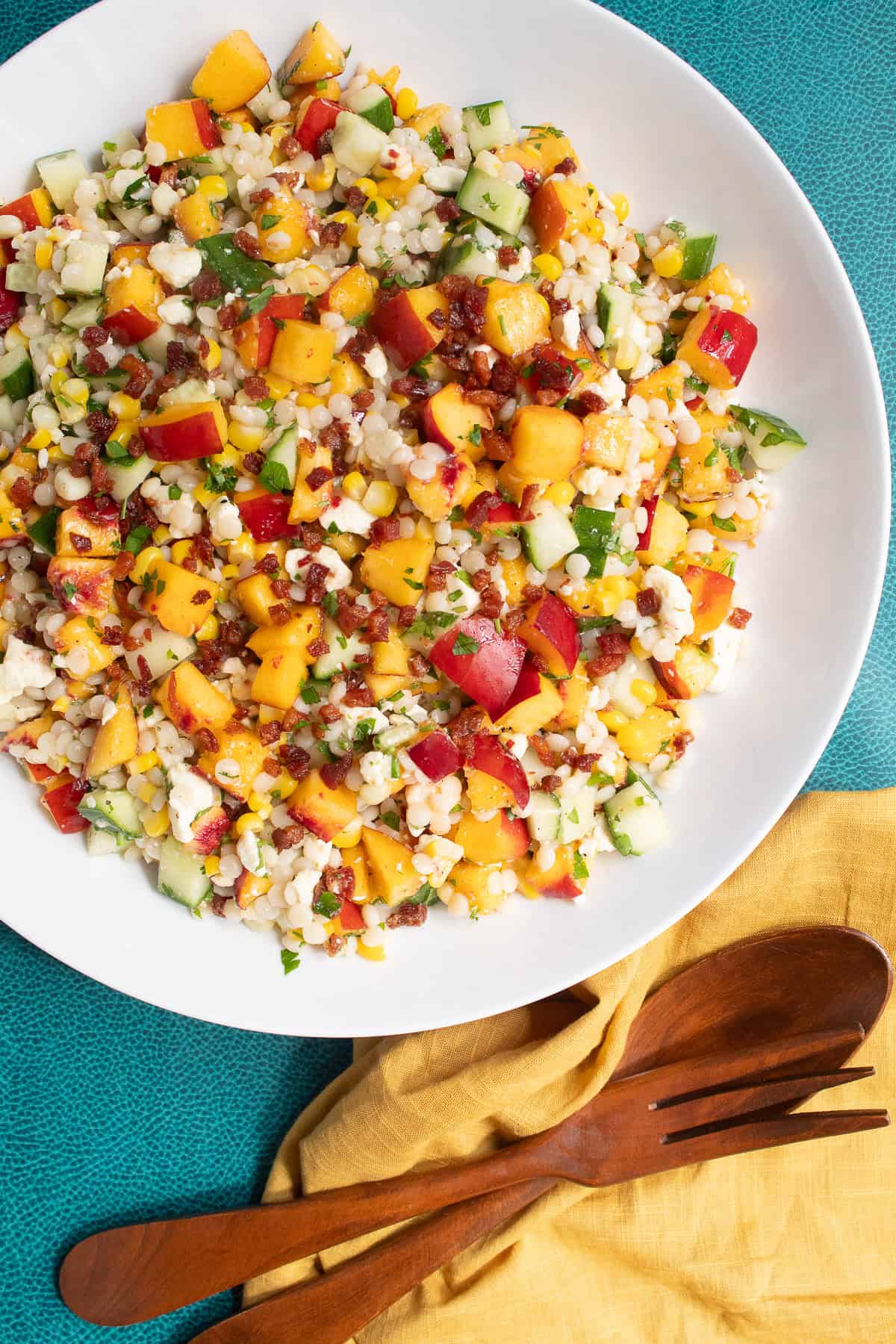 The salad is topped with extra pancetta and nectarines.