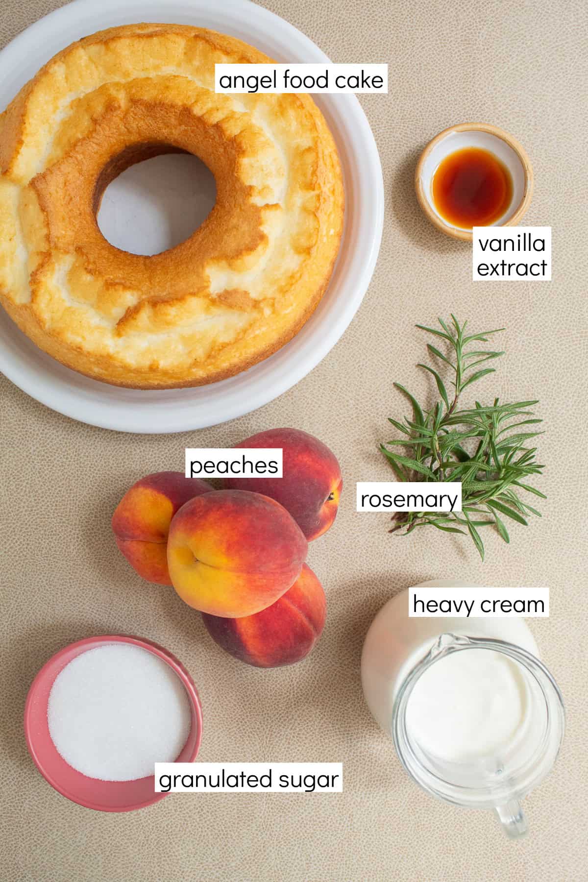 Ingredients for the recipe are displayed and labeled with white text boxes including the words angel food cake, vanilla extract, peaches, rosemary, granulated sugar, and heavy cream.