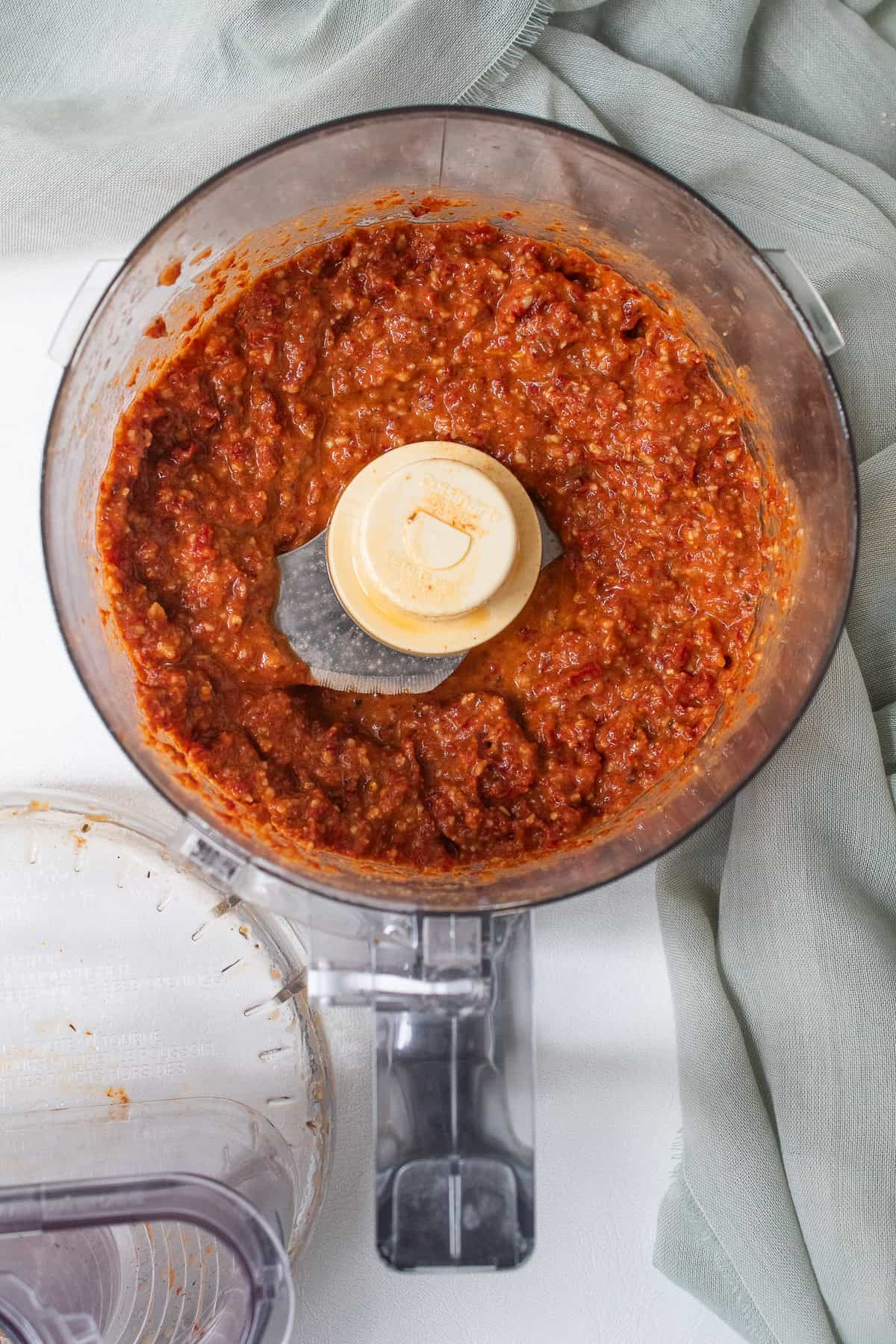 The red pesto is processed until it is uniform but still has a lightly chunky texture.