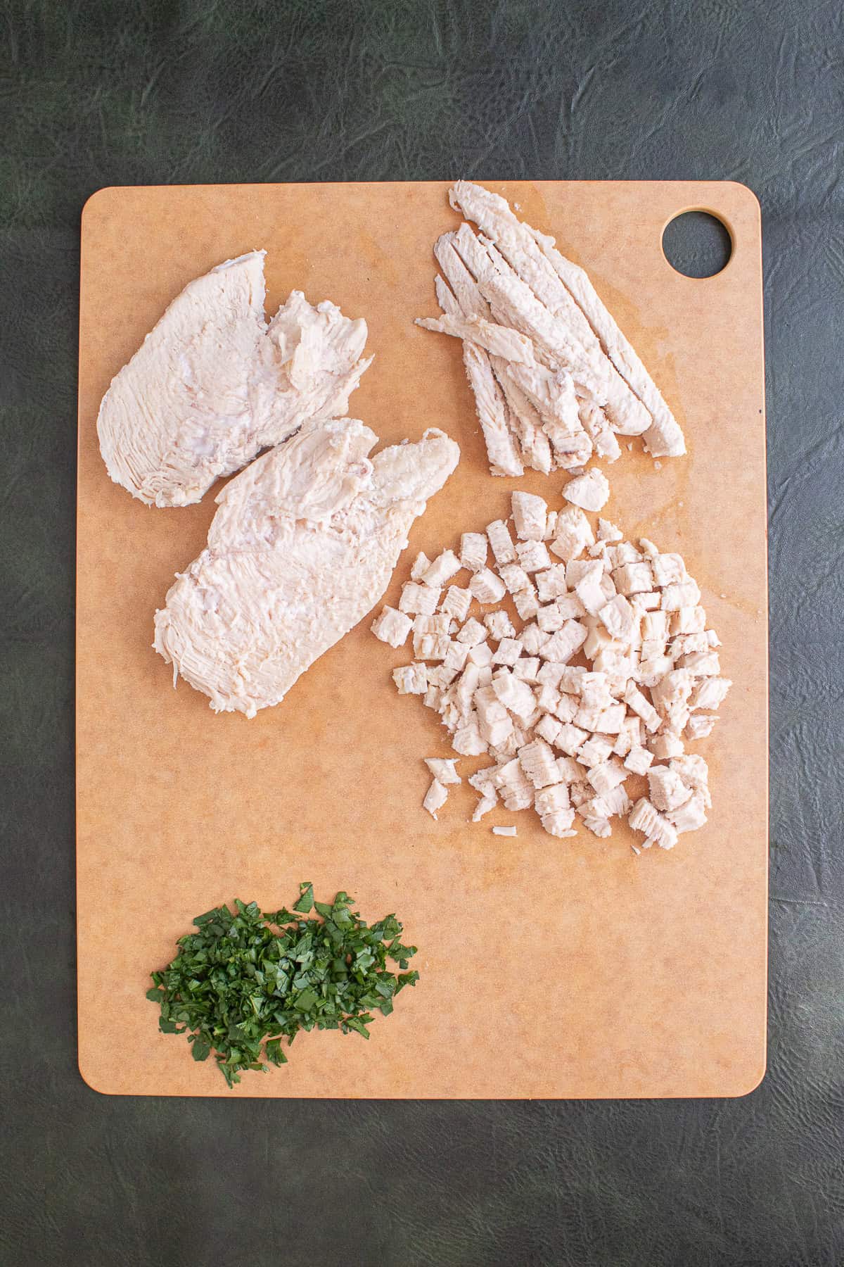 While the pasta cooks the chicken and parsley are diced.