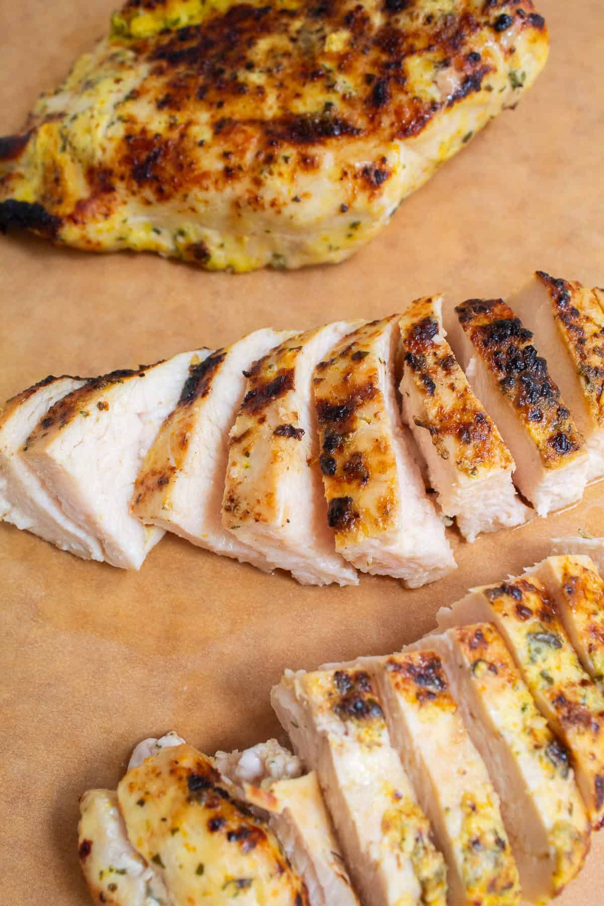 The tender and juicy chicken breast is sliced into pieces.