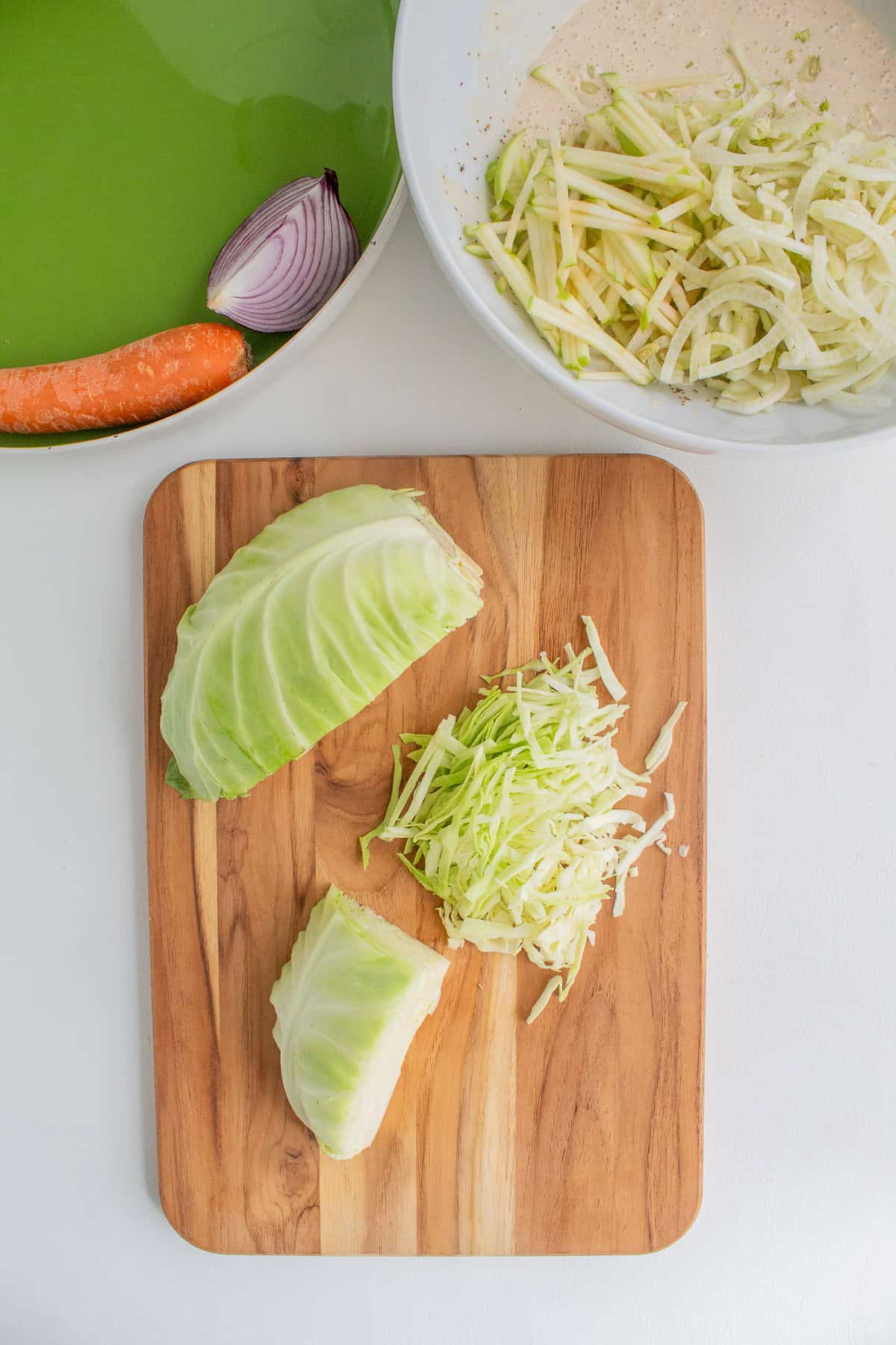 Cabbage is sliced into thin shreds.