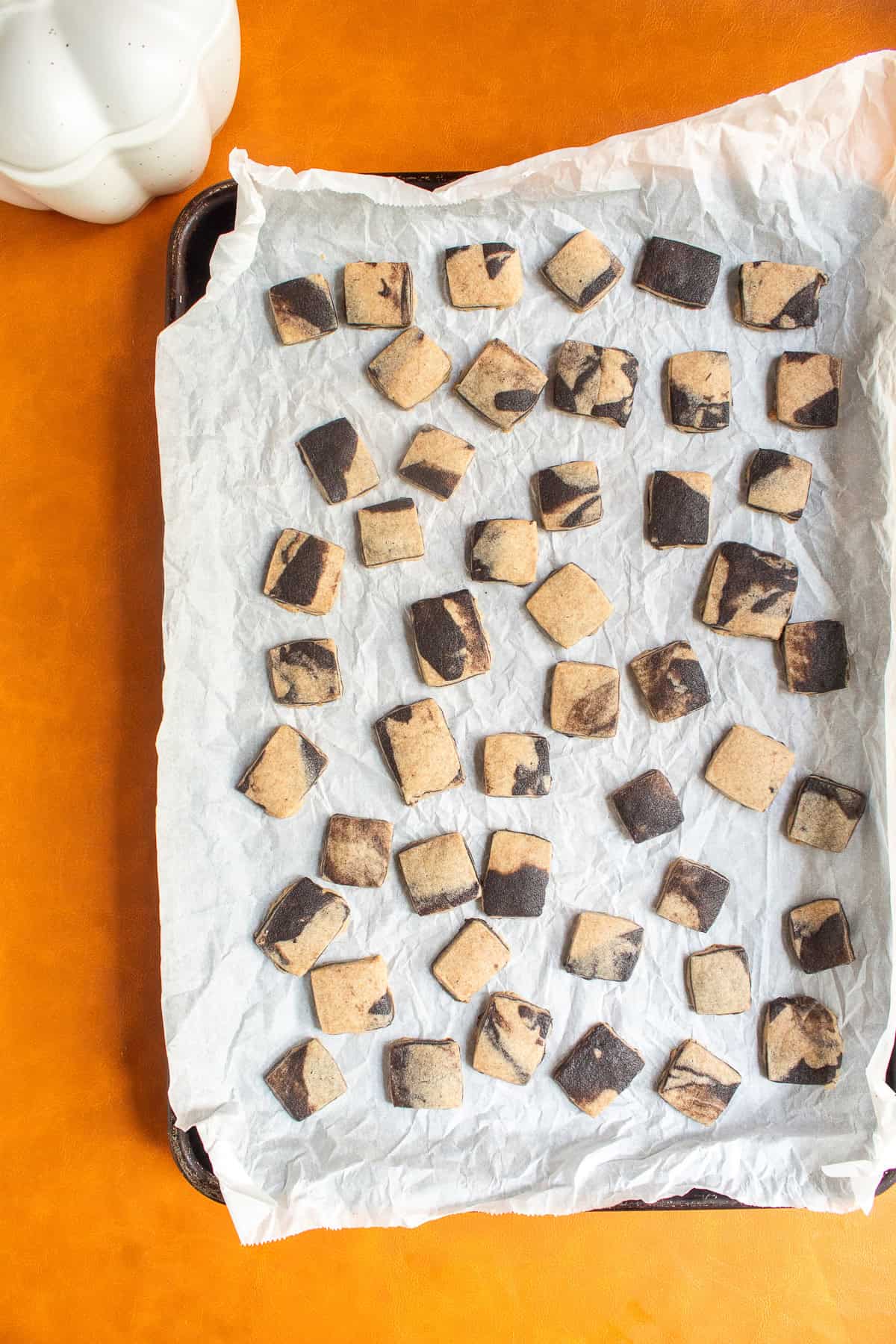 The baked cookies are no longer shiny and slightly puffy.
