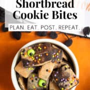 Tiny cookies with sprinkles and green eyeball decorations it in a small white bowl. A white text box at the top of the image contains the words, "halloween shortbread cookie bites" and "plan. eat. post. repeat."