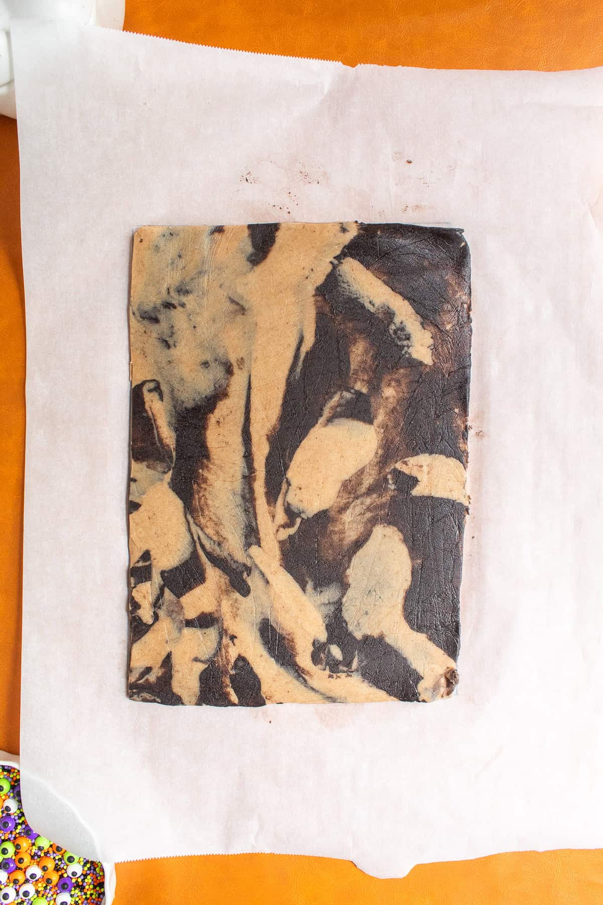 The dough is trimmed to a 8-inch by 12-inch rectangle.