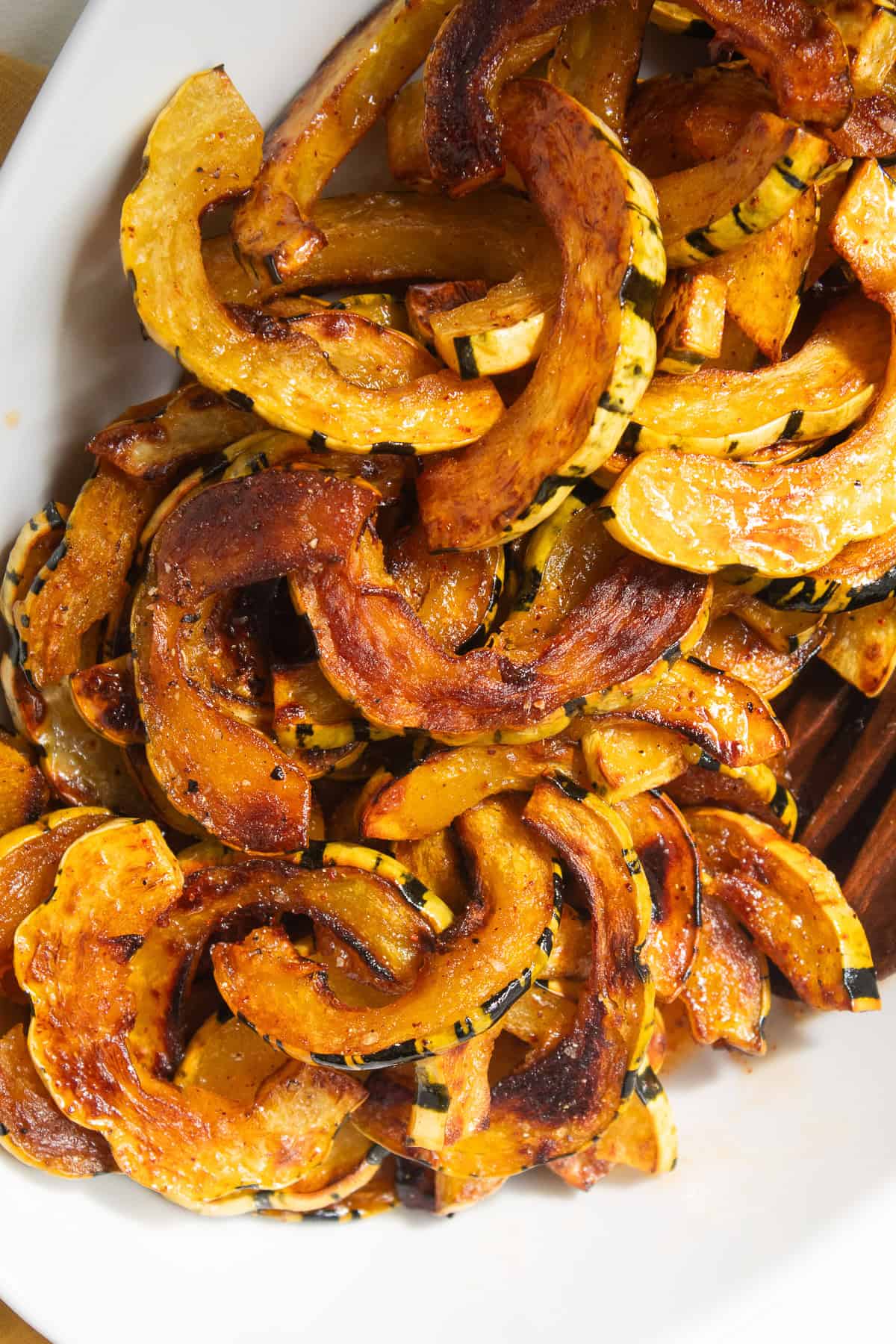 The deeply caramelized squash is glazed with the maple and ancho vinaigrette.