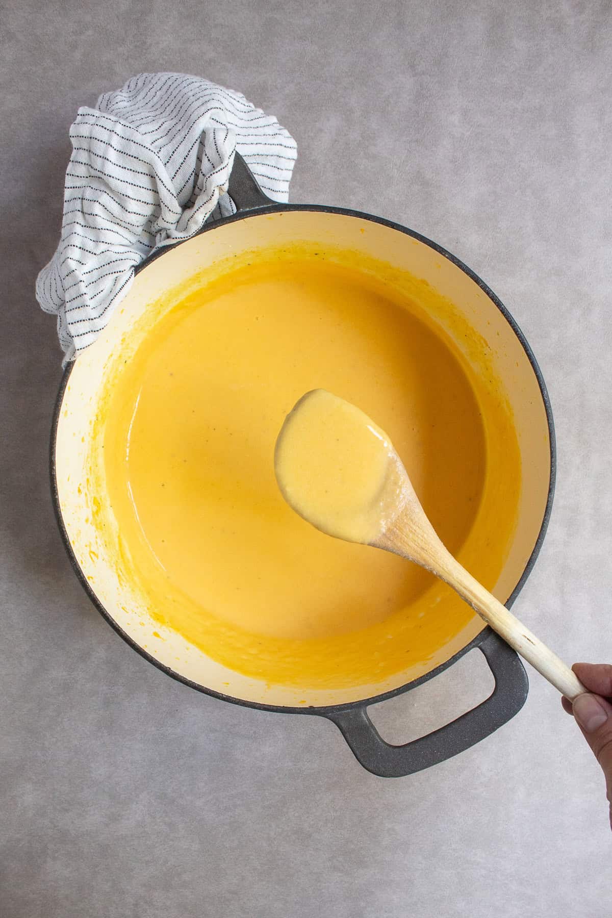 The finished butternut cheese sauce is smooth and glossy.